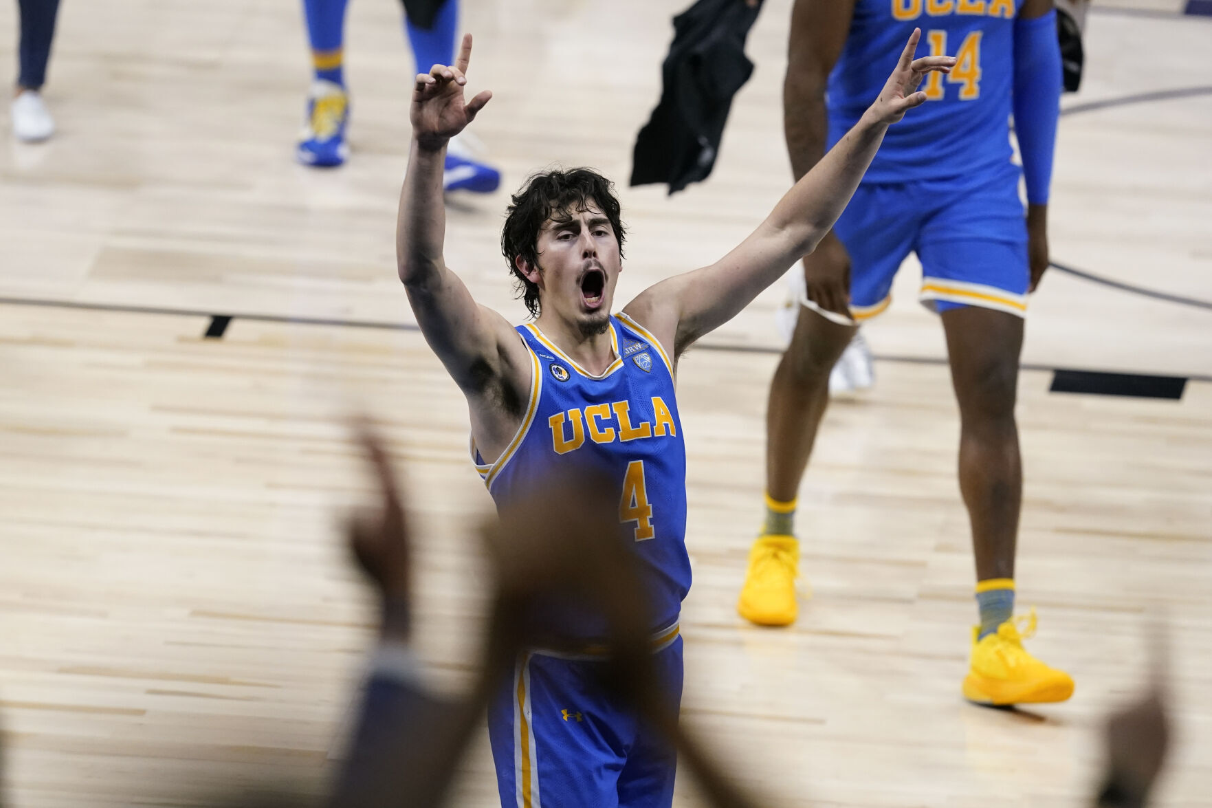 APTOPIX NCAA UCLA Michigan Basketball